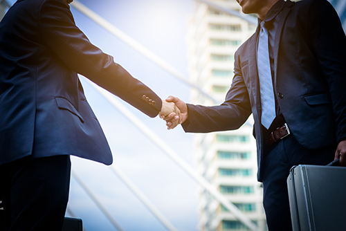 Successful partnership with a handshake between branch manager and ITM vendors in NJ